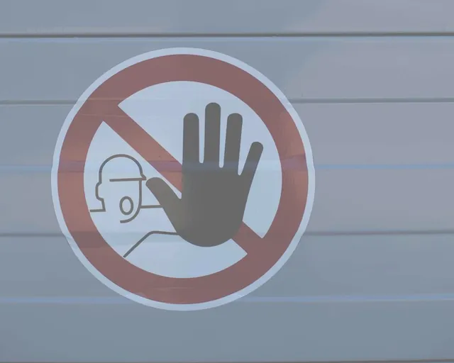Panneau d'interdiction d'accès sans équipement de protection respiratoire